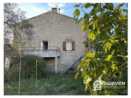 maison de village avec un grand garage et jardin