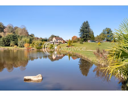 cadre idyllique  étang aux normes de 6200 m2 sur 2 3 hectare