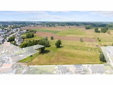 bouwgrond met gezinstuin en aanpalend grasland op 7.598m²