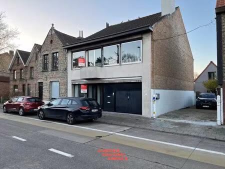 opbrengsteigendom bestaande uit 2 appartementen met garage