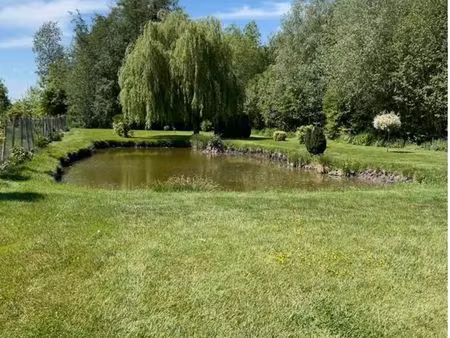 terrain de loisirs avec étang privé et rivière
