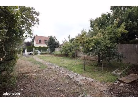 terrain 3 pièces 56 m²