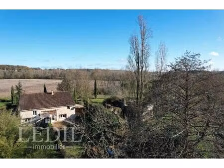 deux maisons adjacentes avec garage  lac sur 3ha au bord du dropt