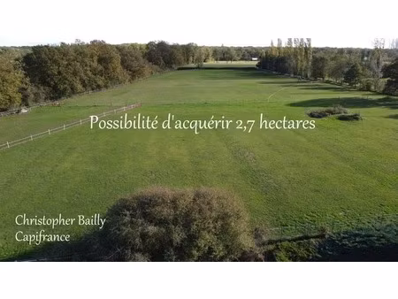 terrain en zone ux dans une zone d'activités