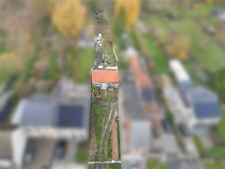 bouwgrond met pand op toplogging in wetteren.