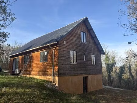 maison en bois avec annexe