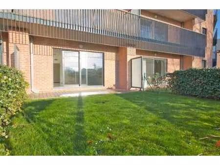 lumineux appartement 2 chambres + jardin cave et parking