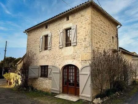 jolie maison en pierre avec double garage