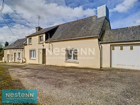 ensemble immobilier de 2 maisons en pierres à saint connan sur environ 1400 m² de jardin