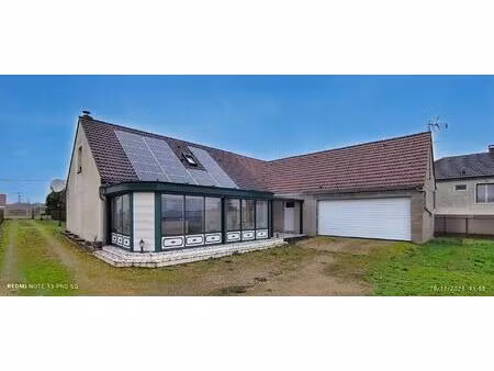 grand pavillon avec 4 chambres et véranda lumineuse de 25m2  extension avec double garage.