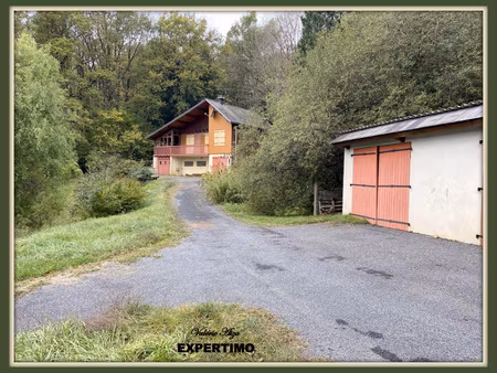 chalet bois avec 1ha 26a de terrain attenant