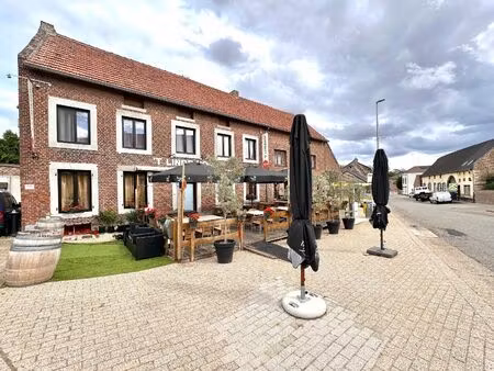 ruim handelspand (café-restaurant) met terras  woonmogelijkheid en garage in rutten (tonge
