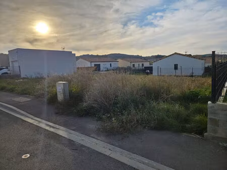 ref-roche- 5min carcassonne - terrain constructible 513m²