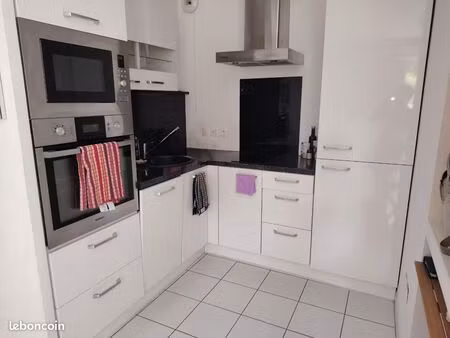 f2 avec jardin et parking