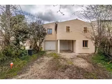 maison avec 2 à 3 chambres et garage aménageable
