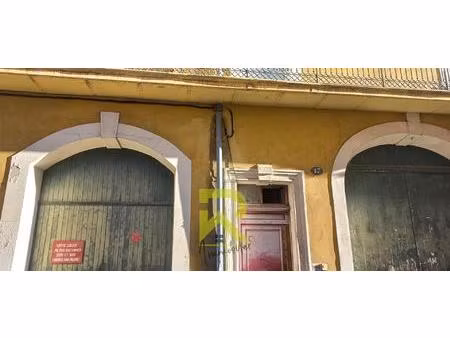 béziers centre un immeuble d'habitation de 393m2 avec garages à rénover .