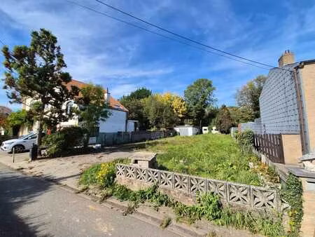 terrain à bâtir avec garage - rue à faible passage