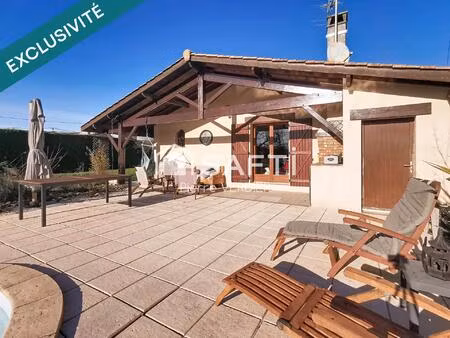 proche zone commerciale  piscine  2 garages  calme