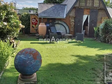 entre laval et vitré. a vendre en viager. chalet avec dépendances et terrain arboré dans u