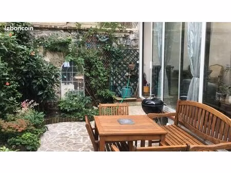 appartement atypique 60 m2 avec jardin privatif en plein coeur des batignolles