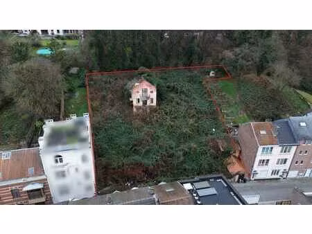 terrain. poss. de construire à 6% à côté de la gare de huy!