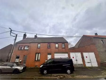 lot de 2 maisons + jardin + 3 garages