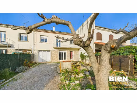 maison rafraîchie avec jardin dans un quartier calme