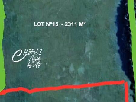 terrain constructible de 2 311 m² situé dans un quartier calme et tranquille  idéal pour c