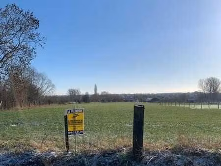 terrain à bâtir - sup. 16a 69ca