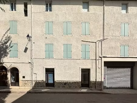 batisse de 373 m2 avec garage et locaux commerciaux- idéal inv