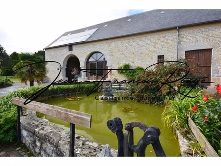 blosville  à 10 kilomètres de la plage  propriété en pierres de 292 m² avec un gîte  une p