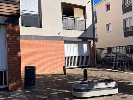 parking à pérols dans résidence fermée