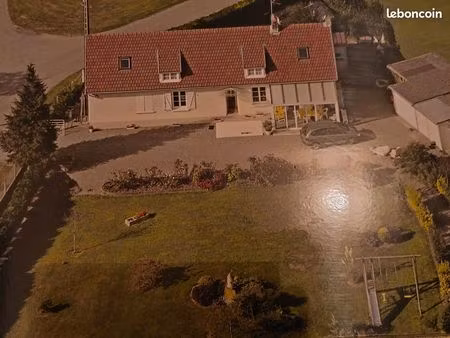 maison de 125 m2 avec jardin et garages