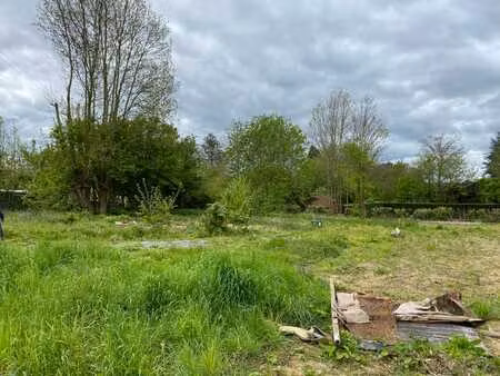 terrain + plans + permis de bâtir