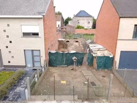 perceel grond te koop te denderleeuw voor gesloten bebouwing