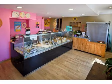 local commercial de 31 m²  réserve  bureau  cave  et logement au dessus de 128 m²