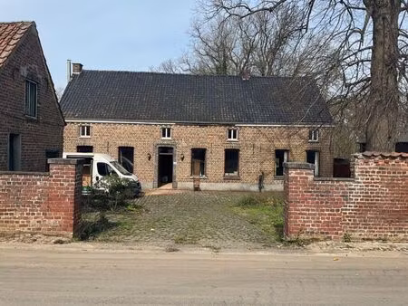 hoevewoning met bijgebouwen met heel wat potentieel