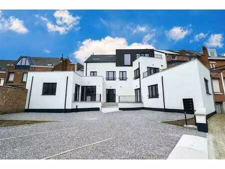 neuf - rdc - terrasse - 2 ch - 1 sdb - centre