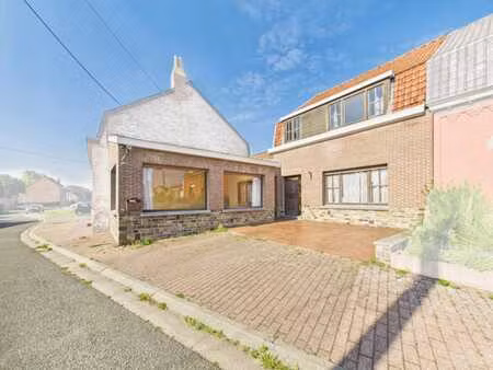 maison mitoyenne avec partie professionnelle  jardin et park