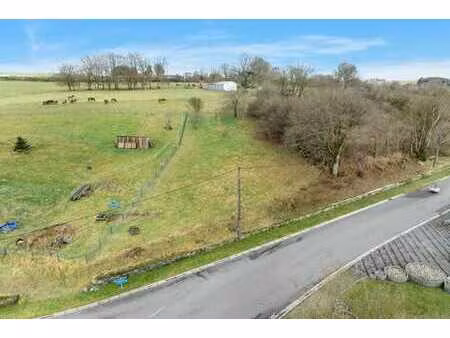 terrain à bâtir à neufchâteau (a 5 min de léglise)