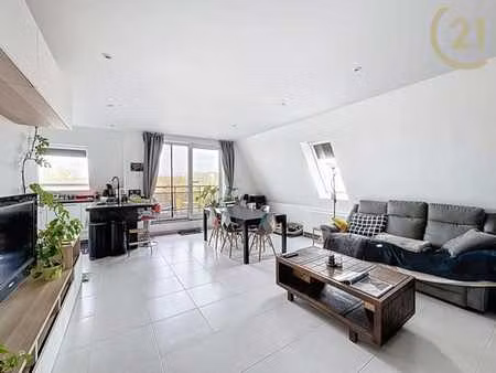 superbe appartement 2 chambres avec terrasse + box à vendre!