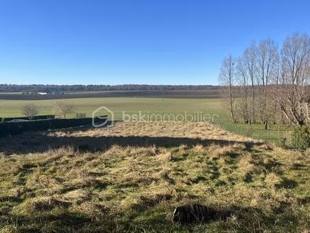 terrain de 2 450 m² à souilly