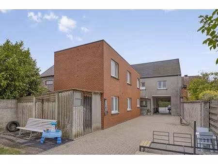 opbrengsteigendom bestaande uit twee ruime en verhuurde appartementen in herk-de-stad