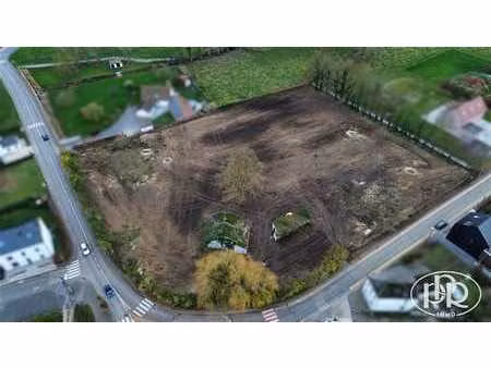 idéalement situé  terrain à bâtir maison 3 façades