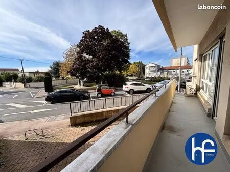 appartement ou local professionnel + balcon + parking + cave