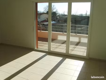 t3 traversant avec 2 terrasses + 2 parkings s/sol