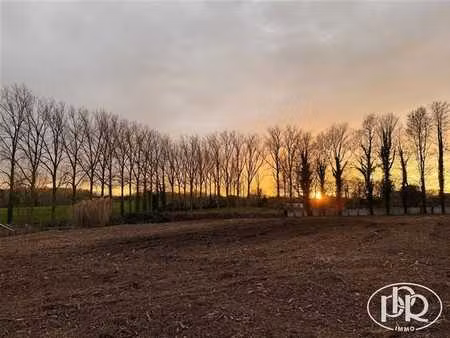 idéalement situé  terrain à bâtir maison 3 façades