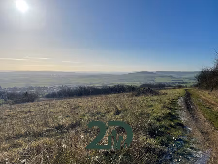 terrain constructible sur les hauteurs d'amance avec vue imp