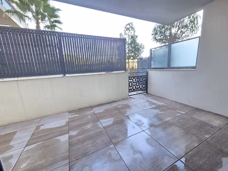 appartement t2 rez-de-jardin dans un immeuble de standing