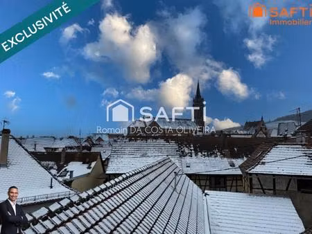 superbe appartement de 4 pièces disposant d'une cave et d'une place de stationnement couve